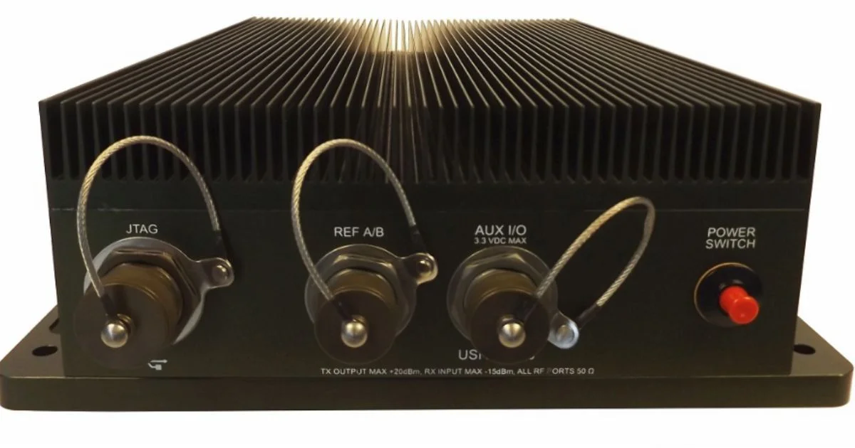 Rugged SDR unit with sealed front connectors.